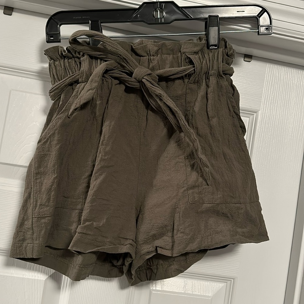 Olive green paper bag shorts with tie waist and pockets